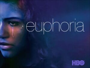 A poster with a crying person and the word “euphoria”